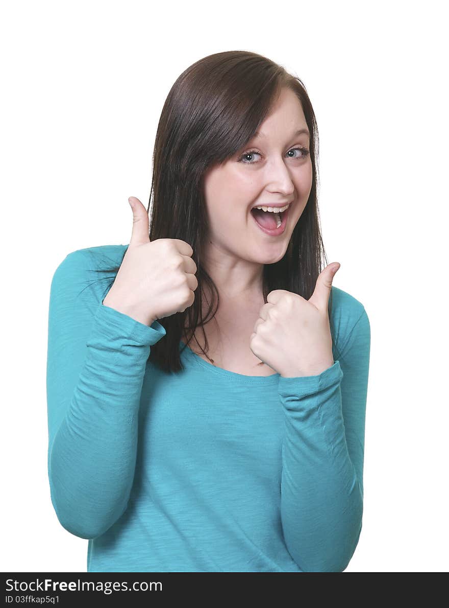 An exressive, happy young woman gives the thumbs up. Set against a white background. An exressive, happy young woman gives the thumbs up. Set against a white background.