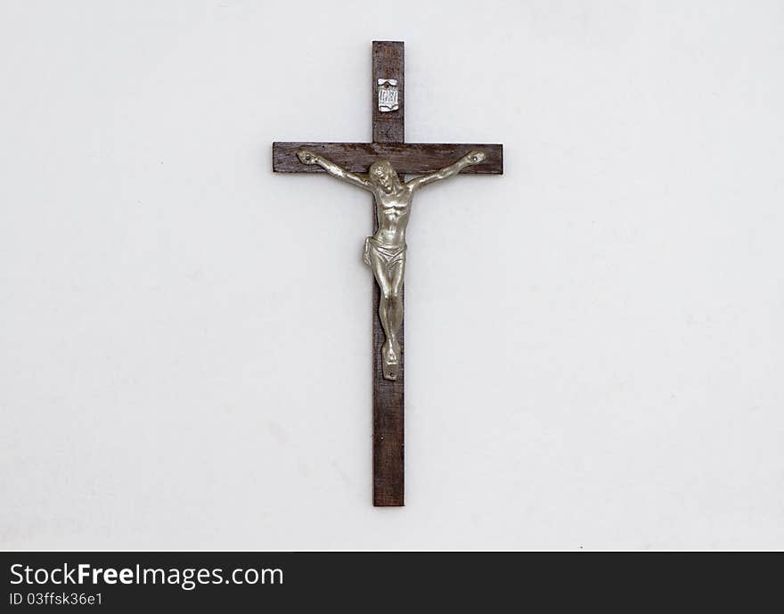 Figurine of crucifixed Jesus on the wall