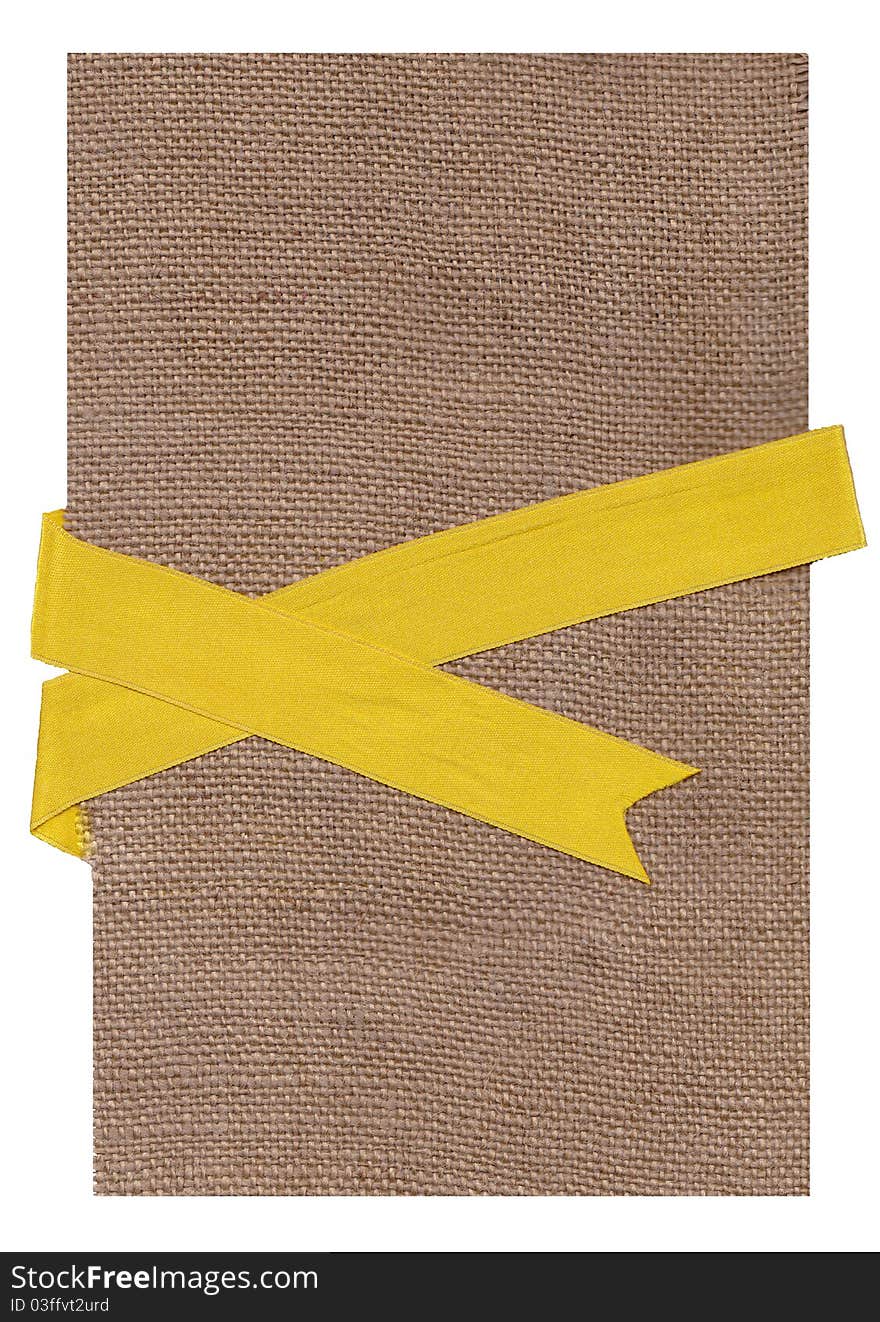 Textile background.Gold ribbon on a fabric.