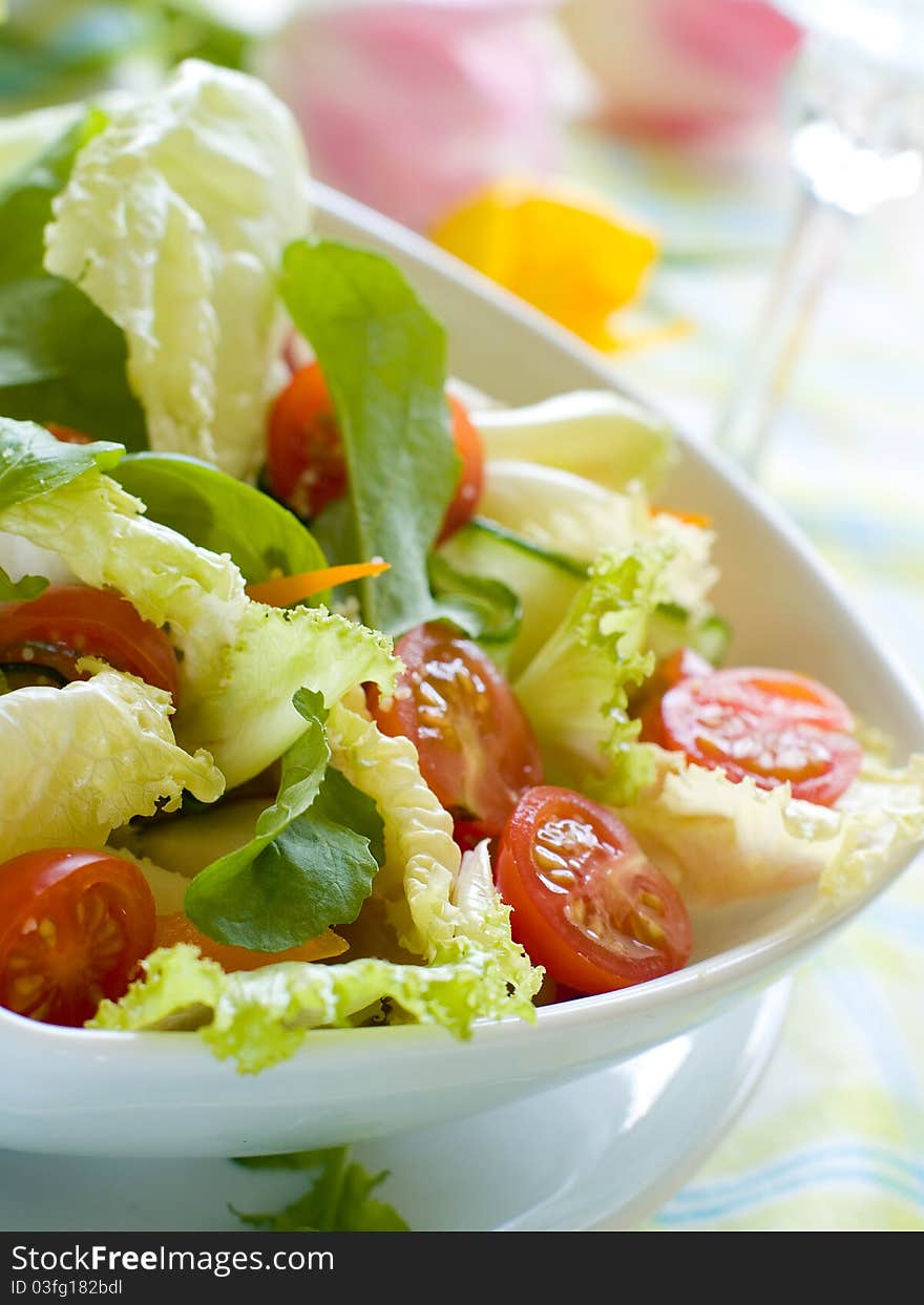 Fresh salad from raw vegetables and lettuce