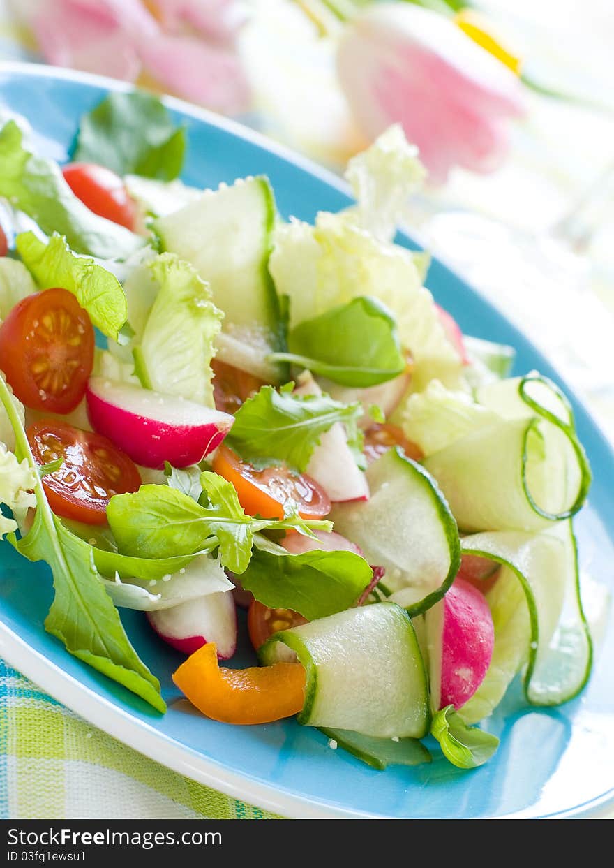 Fresh salad from raw vegetables and lettuce