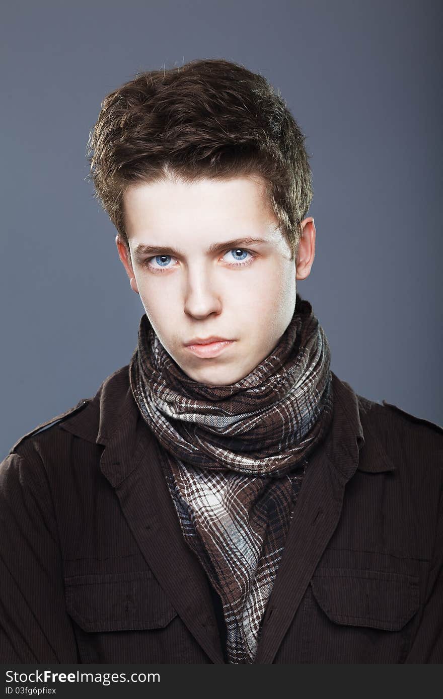 Young man wearing elegant shirt and  scarf