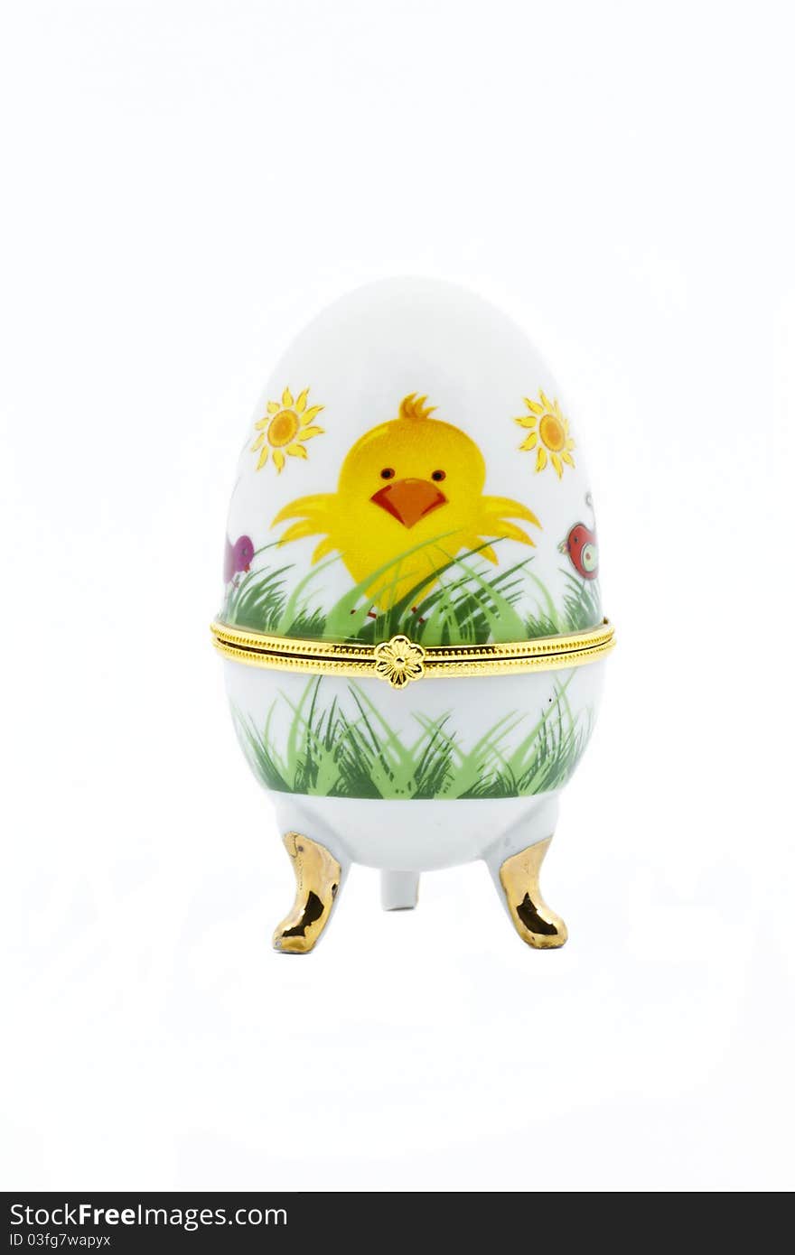 Easter Egg in Decorative Egg Holder isolated on white background. Easter Egg in Decorative Egg Holder isolated on white background