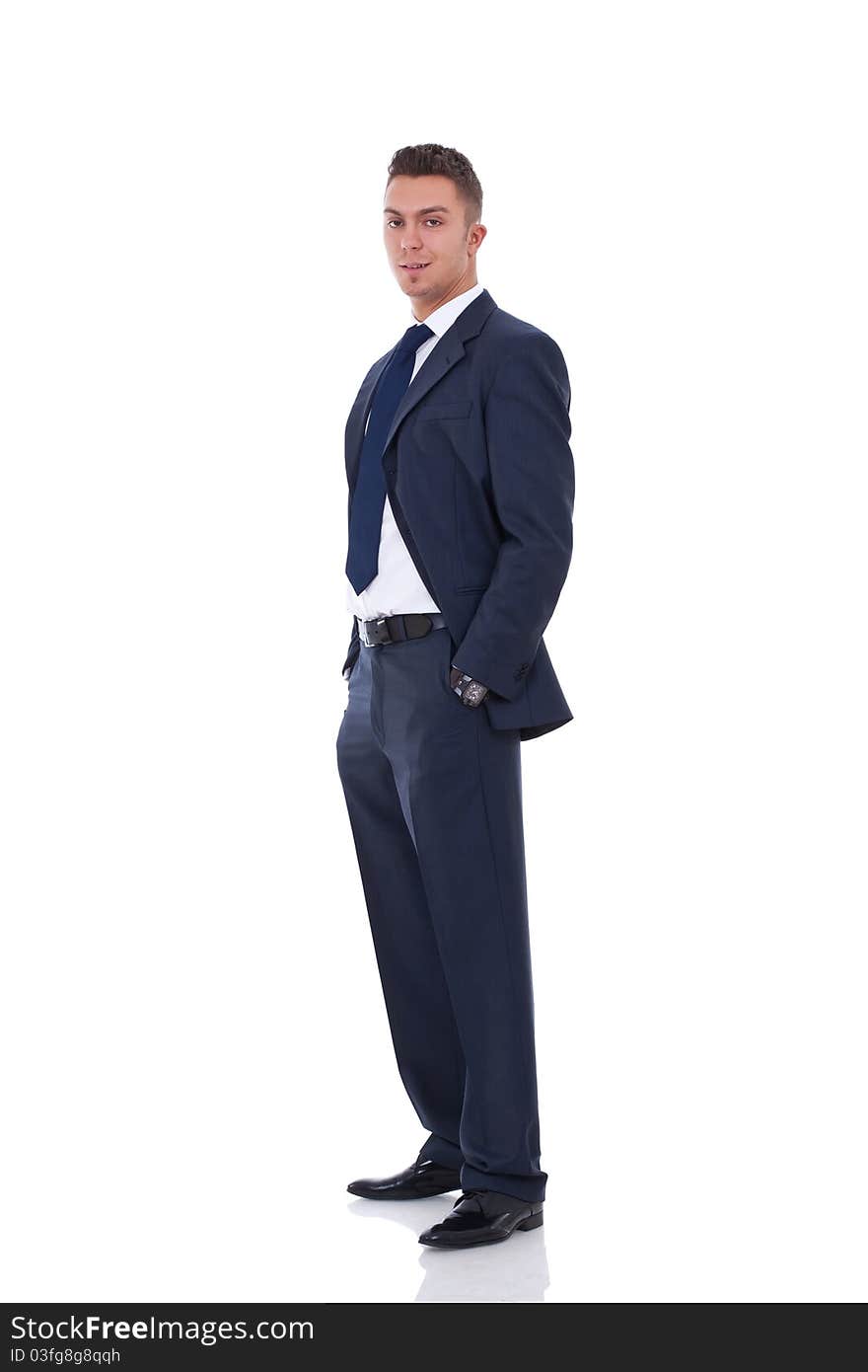 Business Man Standing With Hands In Pocket