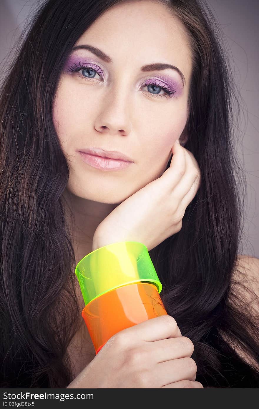 Fashion beautiful girl with colorful bangle