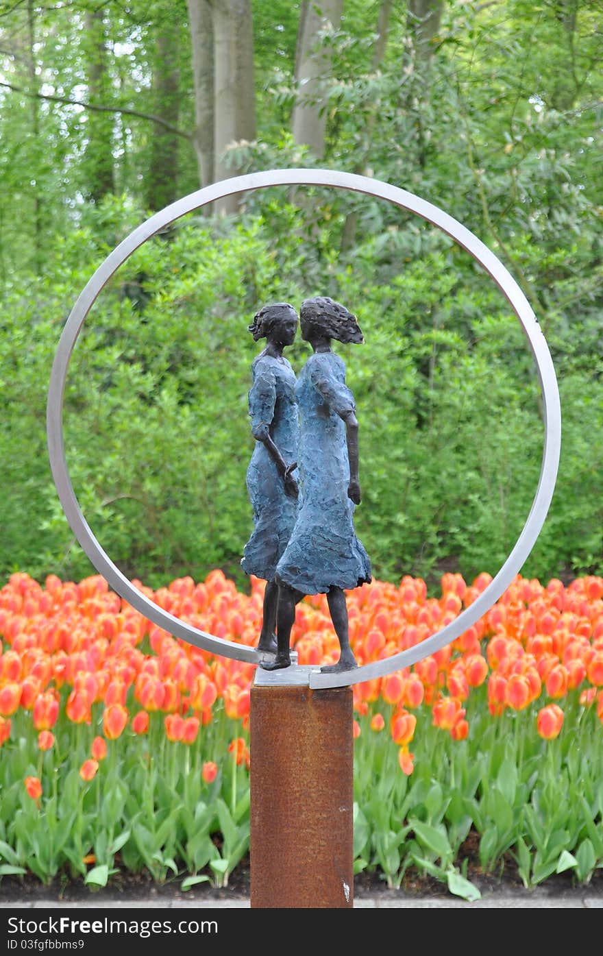 Sculpture with Dutch orange tulips, taken in spring at the Keukenhof in Holland. Sculpture with Dutch orange tulips, taken in spring at the Keukenhof in Holland.