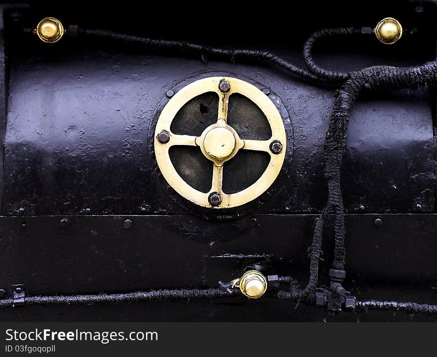 Brass front valve of an old steam train boiler