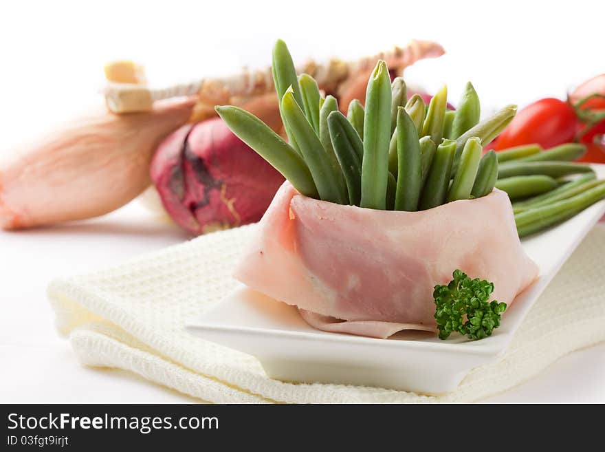 French Beans with wrapped ham