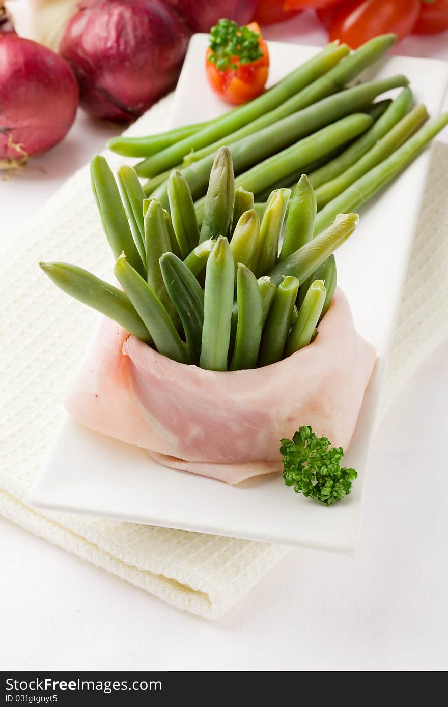 French Beans with wrapped ham