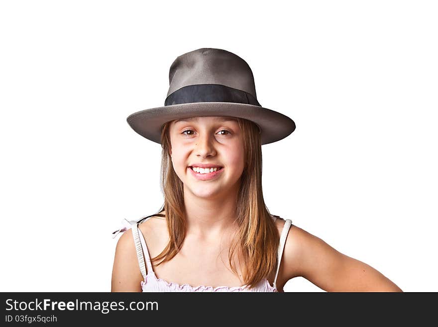 Portrait of cute young teenage girl with hat