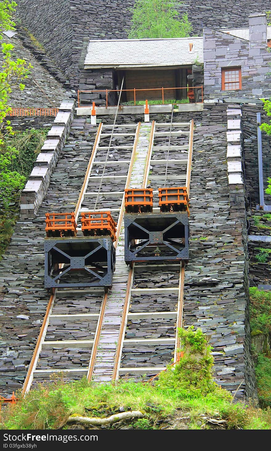 Slate trucks carring slate up the mountain.