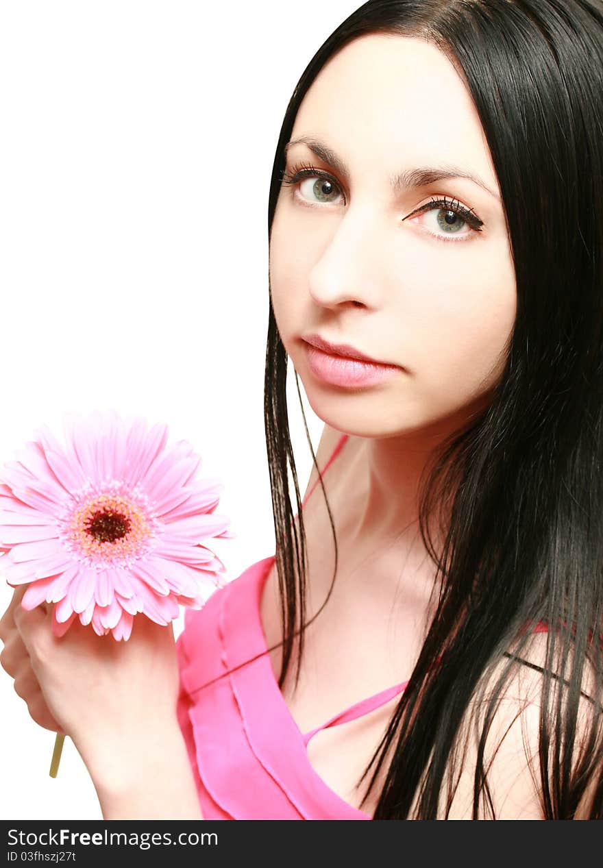 Beautiful young woman on a white background