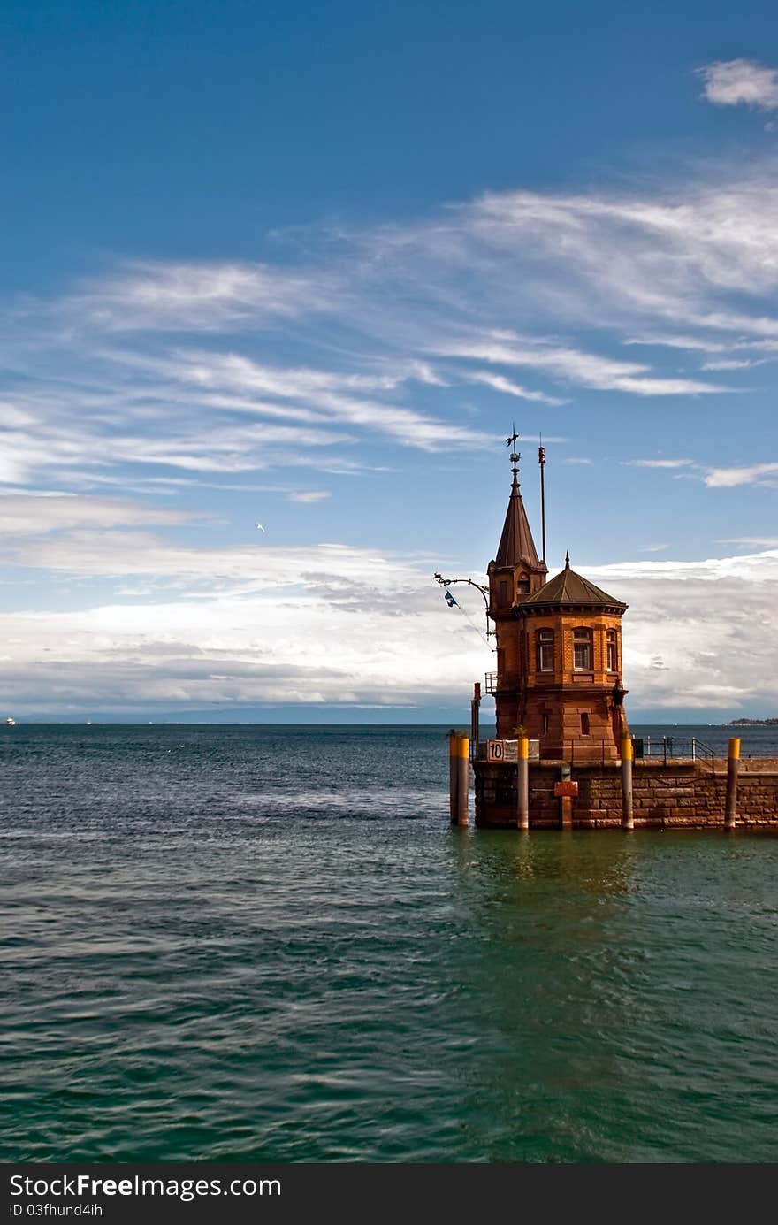 Harbour exit in Constance before blue sky in Lake of Constance. Harbour exit in Constance before blue sky in Lake of Constance