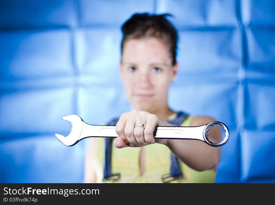 Woman Holding Wrench