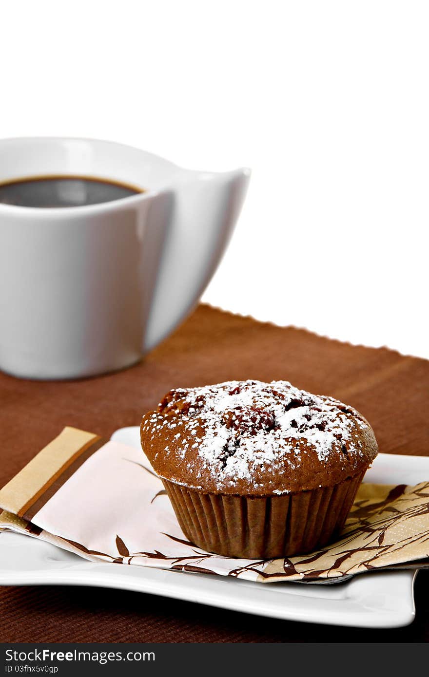 Chocolate muffin and cup of coffee, isolated on white. Chocolate muffin and cup of coffee, isolated on white