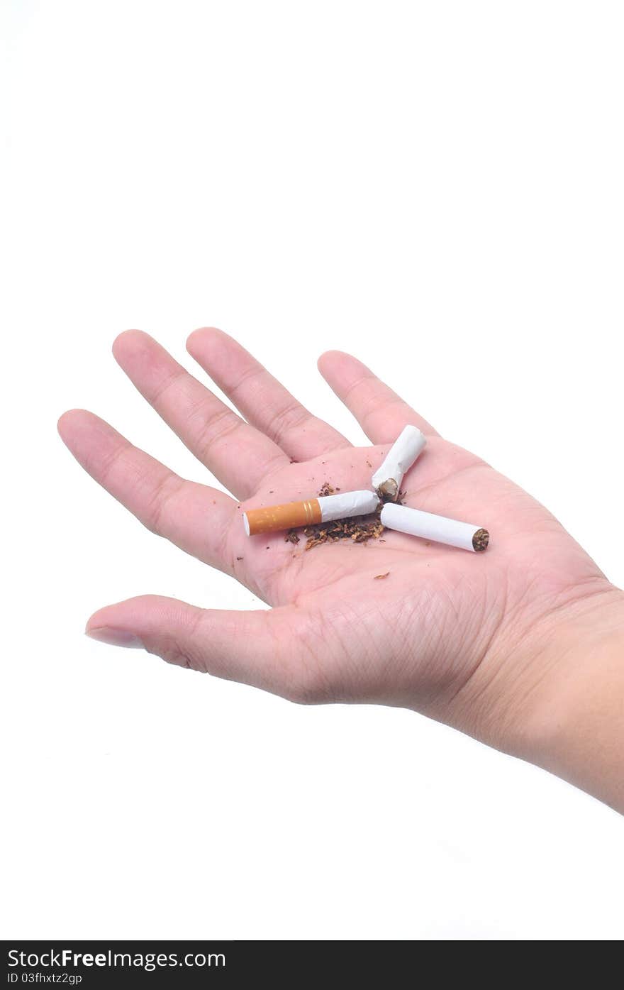 Broken cigarette in palm