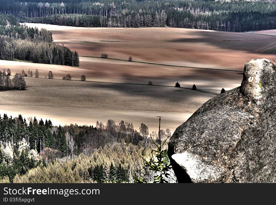 View of European countryside, surrealistic colors, HDR style.