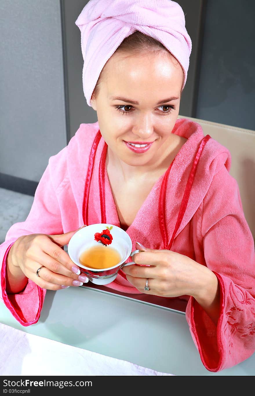 Beauty women with towel on head drinking tea. Beauty women with towel on head drinking tea