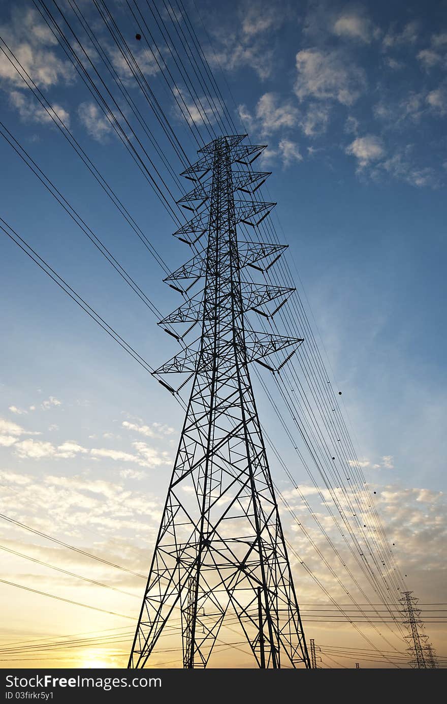 High voltage electric tower under sunset. High voltage electric tower under sunset