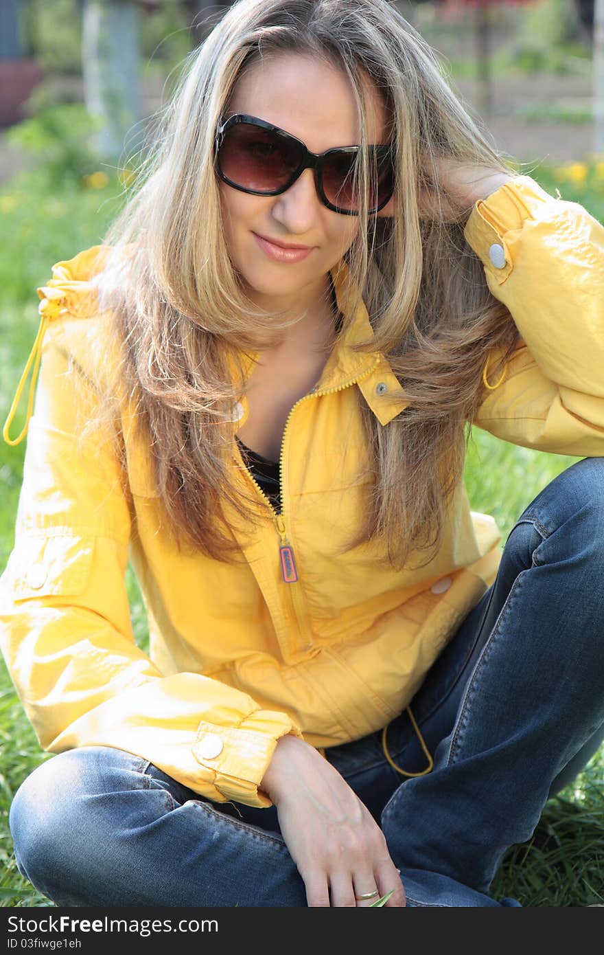 Young beautiful woman in  field