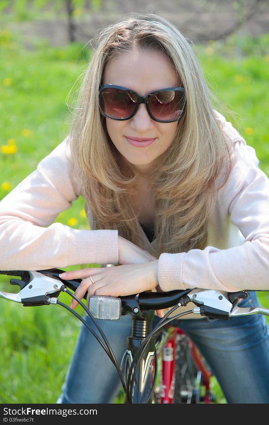 Young woman with bicycle