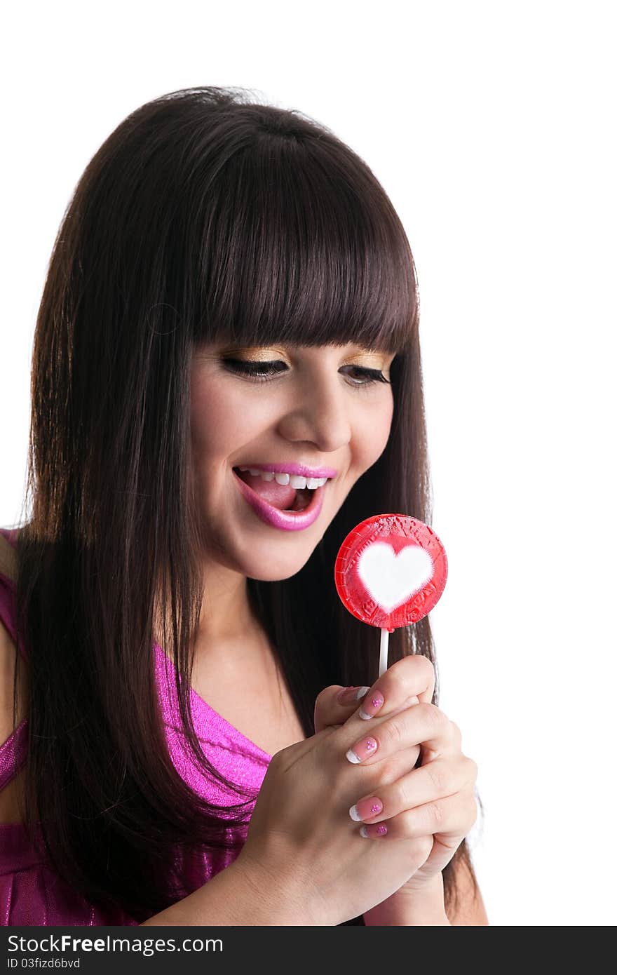 Young Brunette Woman Look At Heart Lollipop