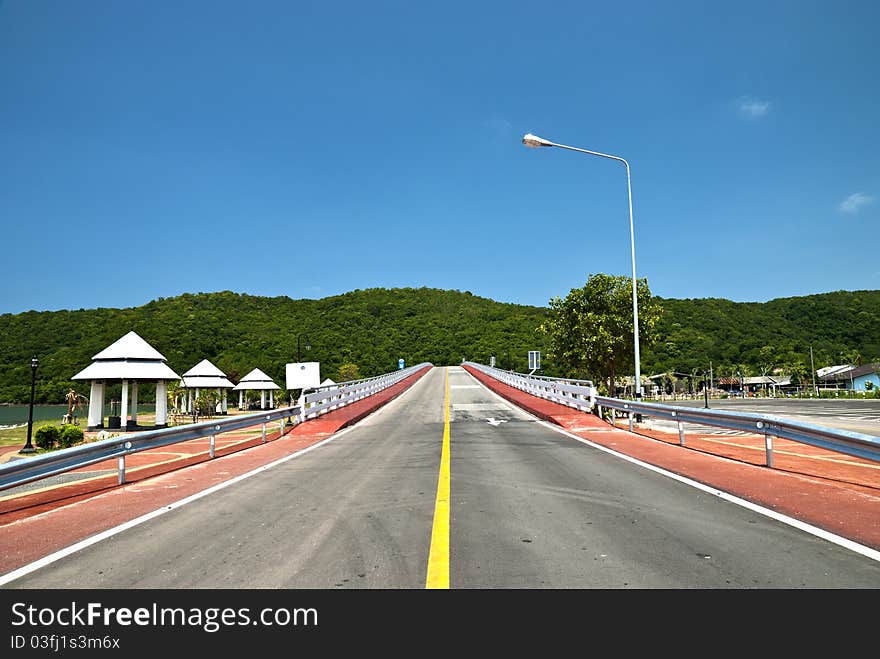 Road under blue the sky. Road under blue the sky