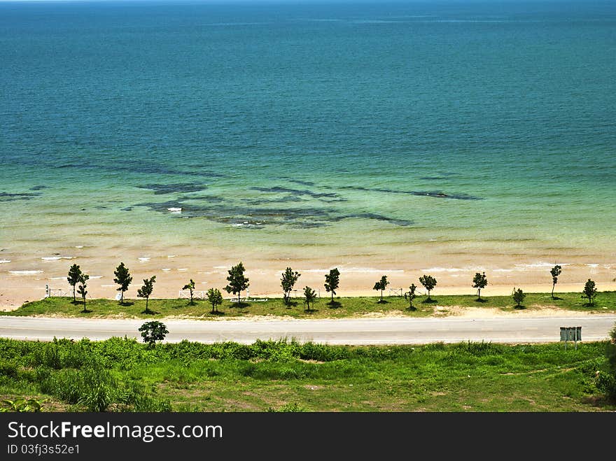 Sand beach ,sea and blue sky