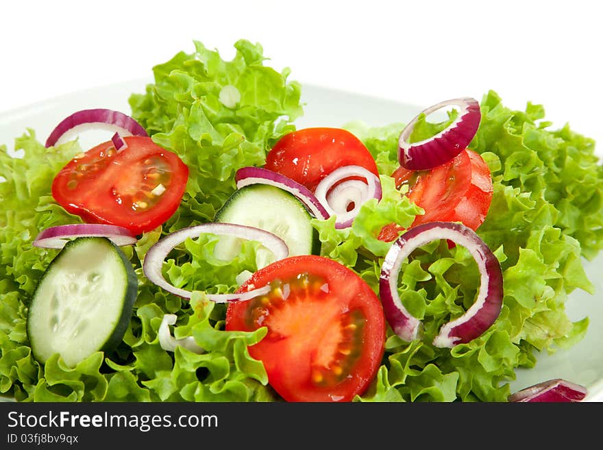 A closeup view from a salad plate. A closeup view from a salad plate.