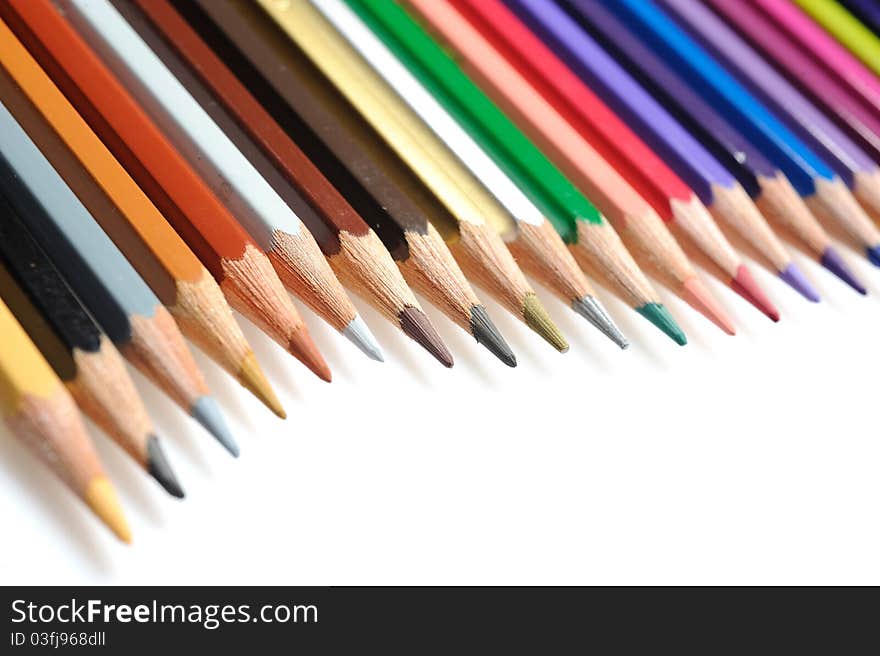 Many colorful school pencils isolated on white background