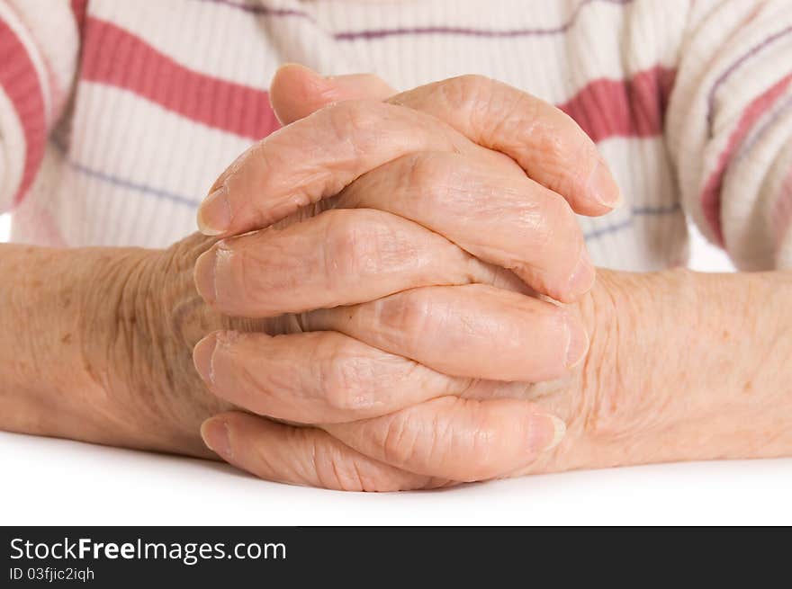 Hands of the old woman close up