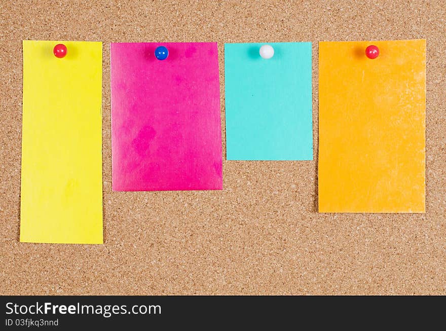 Various Note Papers On Corkboard