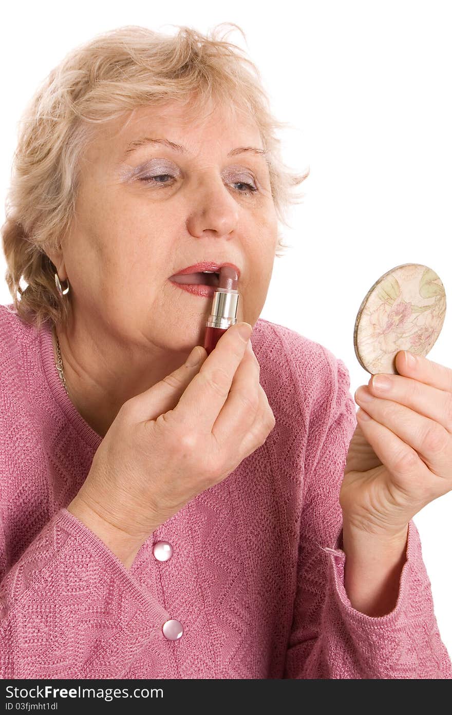 Elderly Woman Does A Make-up