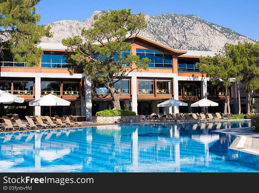 Swimming pool at mediterranean summer resort hotel in Turkey. Swimming pool at mediterranean summer resort hotel in Turkey