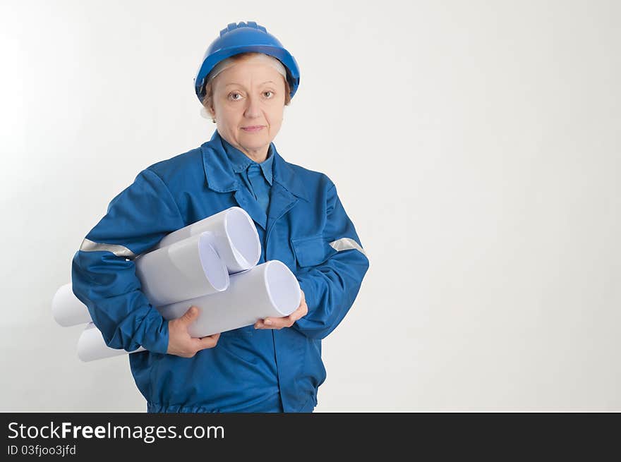 Adult engineer woman holding design plans