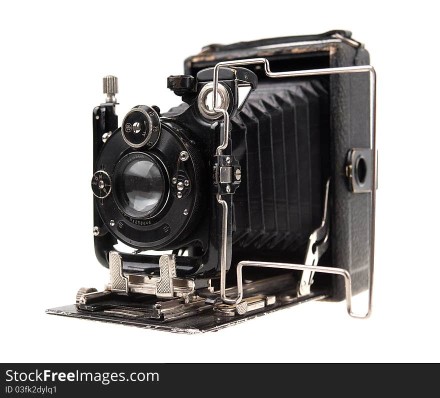 Old-time photo camera on white background. Old-time photo camera on white background