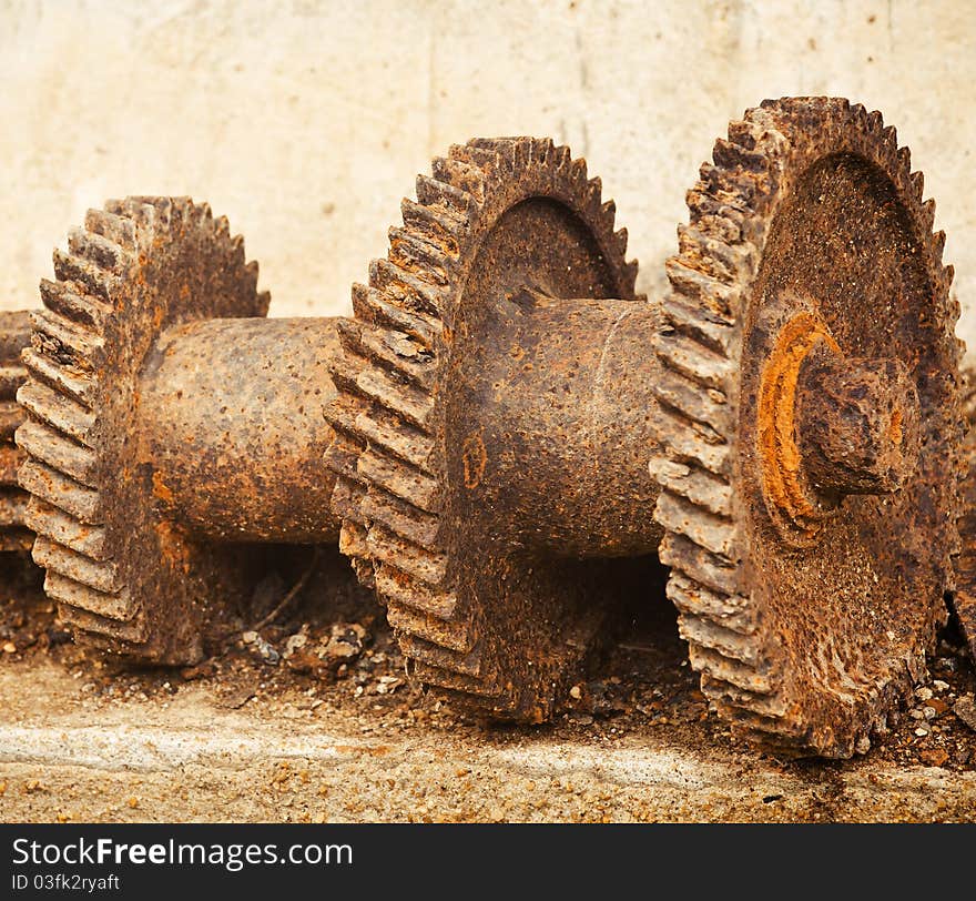 The gears on the old cement. The gears on the old cement