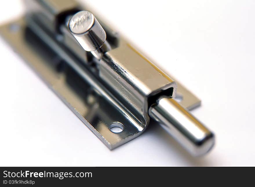 Latch on a white background, macro image