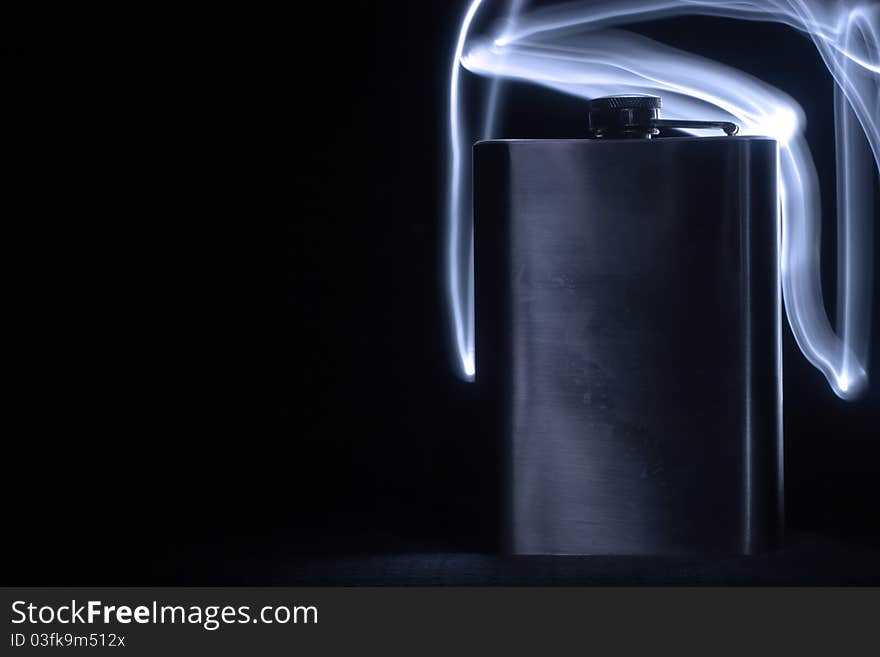 Glass vessels standing on the white table, isolated background