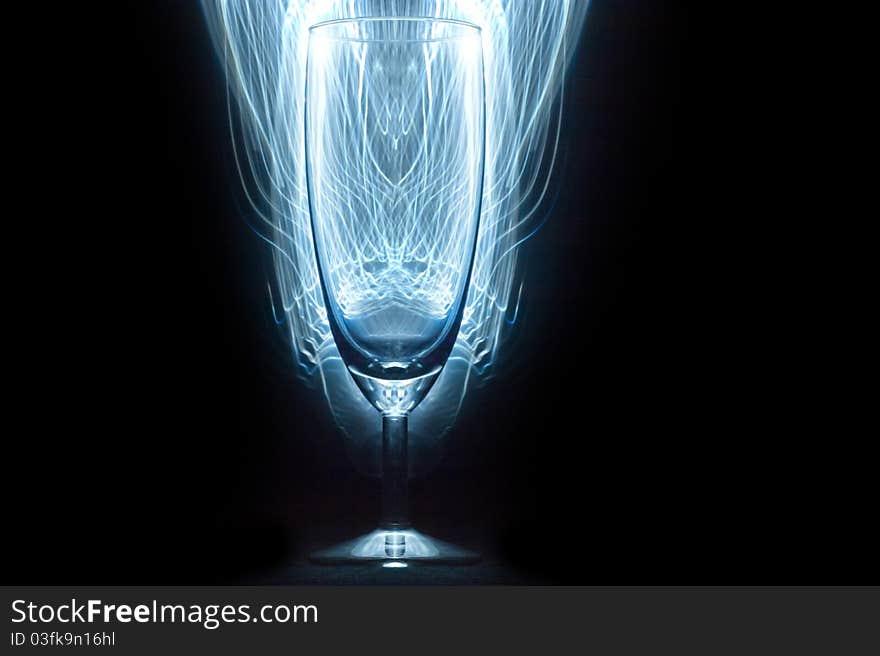 Glass vessels standing on the white table, isolated background