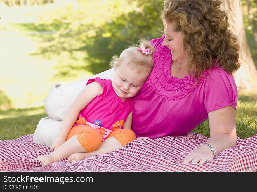 Mother and Daughter on Blanket in the Park