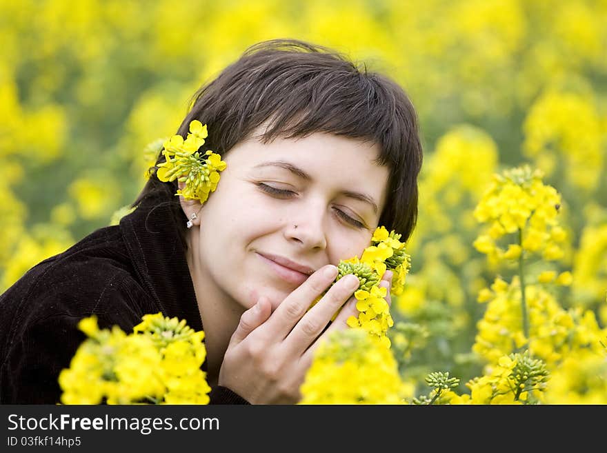 Casual girl enjoying summer in a beautiful field. Casual girl enjoying summer in a beautiful field