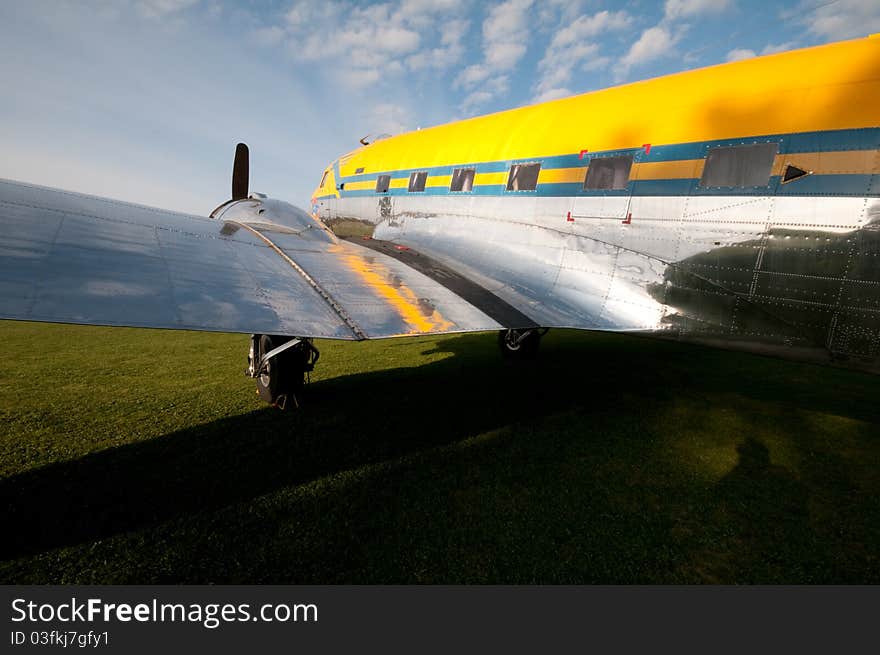 Old airplane on a grassfield outside Stockholm. Old airplane on a grassfield outside Stockholm