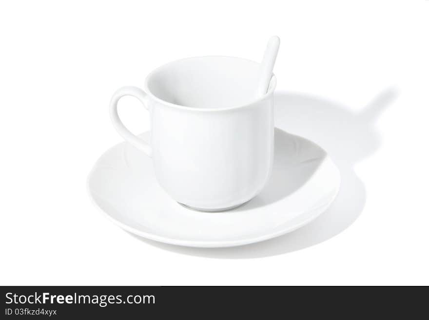 An empty white coffee cup on a white background. An empty white coffee cup on a white background