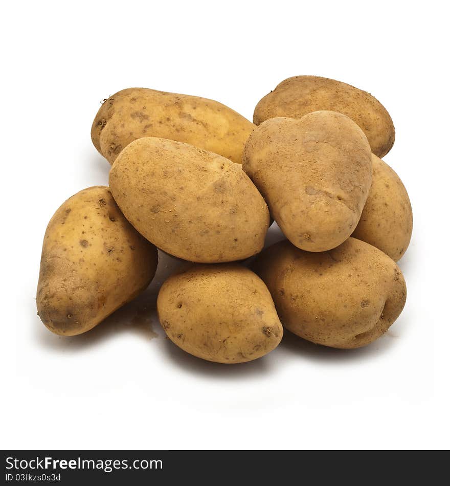 Freshly harvested potatoes isolated on white background