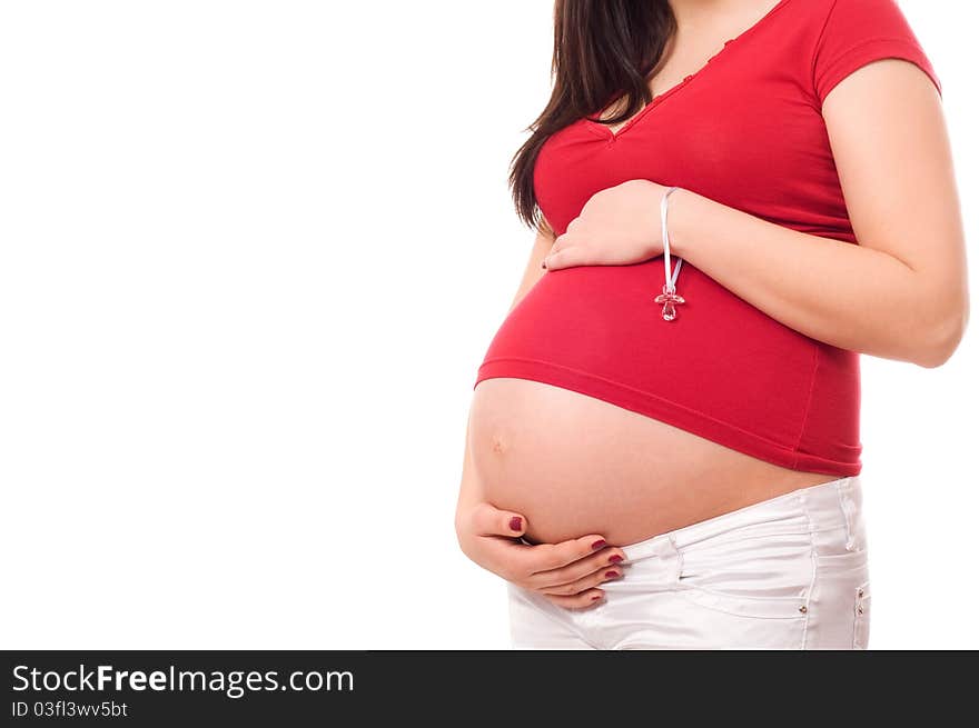 Pregnant woman holding belly over white background