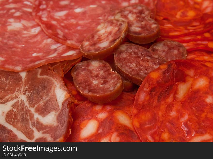 Assorted sliced ??smoked sausage and jerked. Assorted sliced ??smoked sausage and jerked