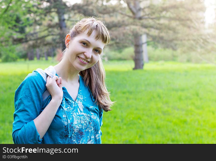 Single beautiful woman relaxing at the park. Single beautiful woman relaxing at the park