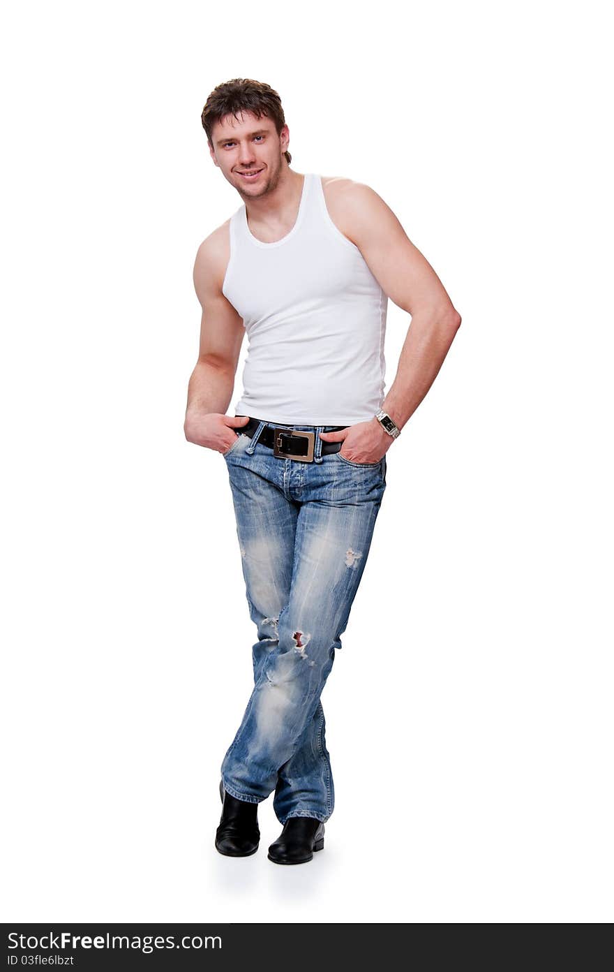 Young man in jeans  is on an isolated background