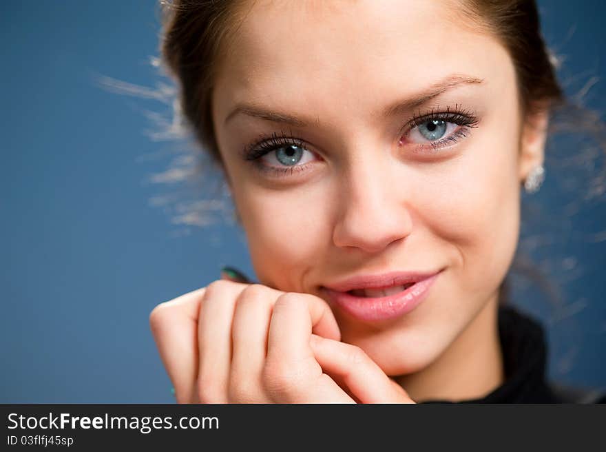 Portrait of a young attractive woman in a black jacket. Portrait of a young attractive woman in a black jacket